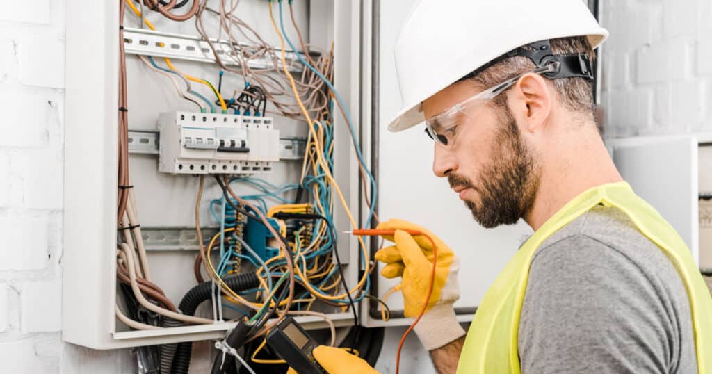 Electrician Working with Wiring