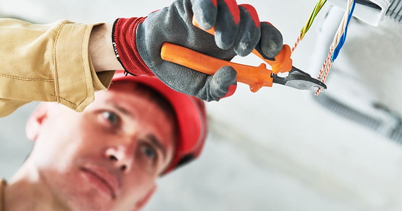 Electrician Working with Wiring