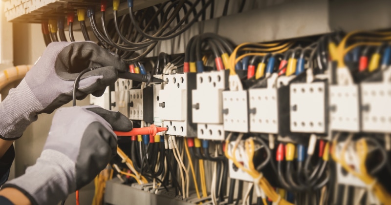 Electrician Working on Wiring