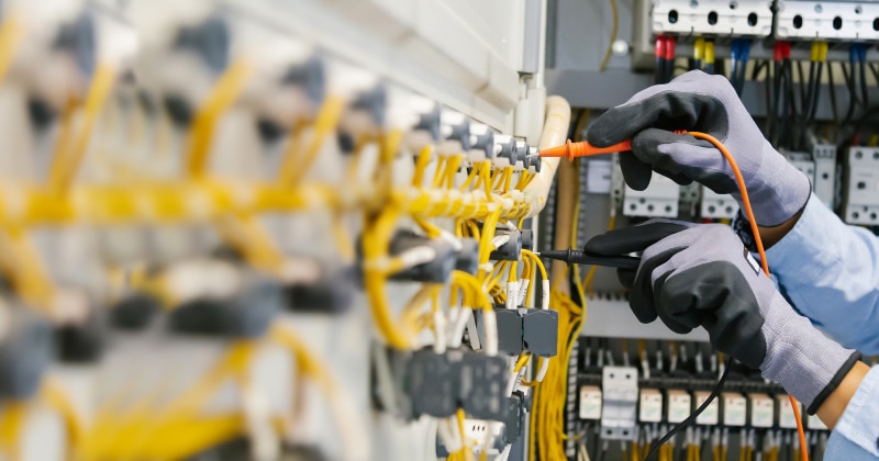 Industrial Electrician Working on Wiring