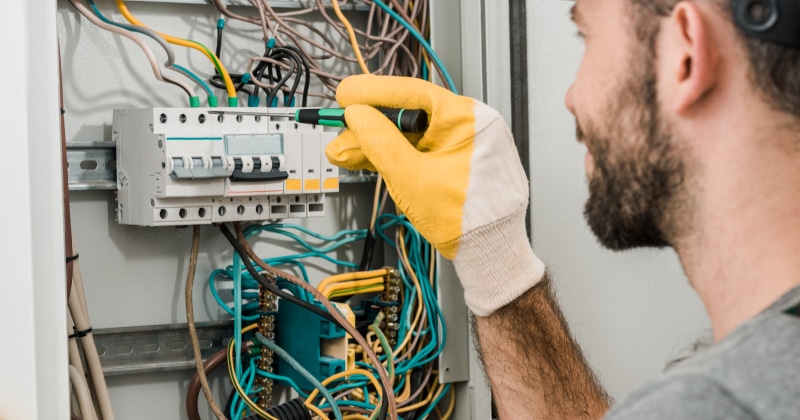 Electrician Working with Wiring