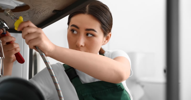 Female Plumber on the Job Site