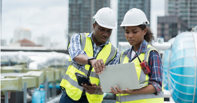 Female Construction Professional and a Male Co-worker