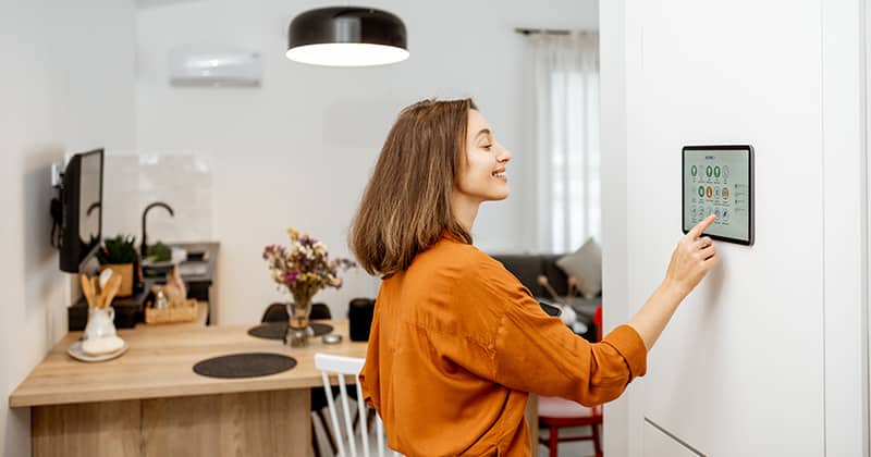 Woman Using Smart  Home Technology