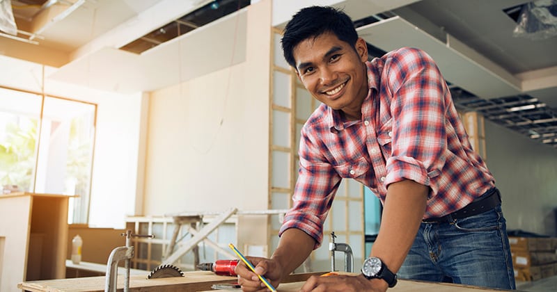 Happy Contractor on a Construction Site