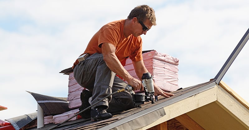 One Roofer Working with a Nail Gun