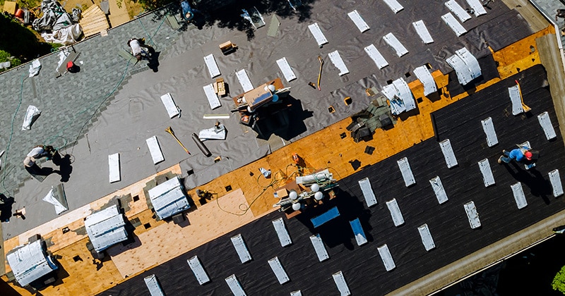 Roofers Working on a Large Commercial Roof