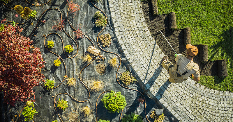 Landscaper Working in a Yard