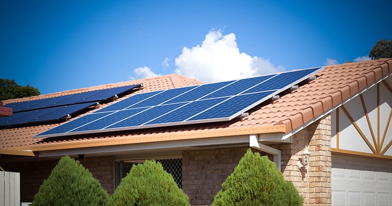 Home with Solar Panels on the Roof