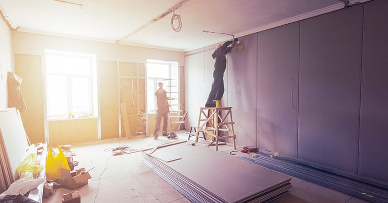 Remodeling Pros Working in a House