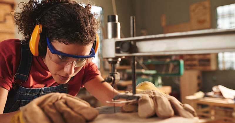 Woman Working with Safety Glasses