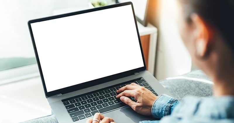 Person typing on computer