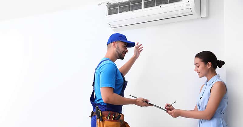 HVAC technician and customer