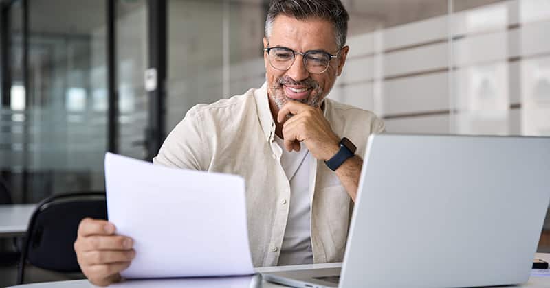 Older man doing research