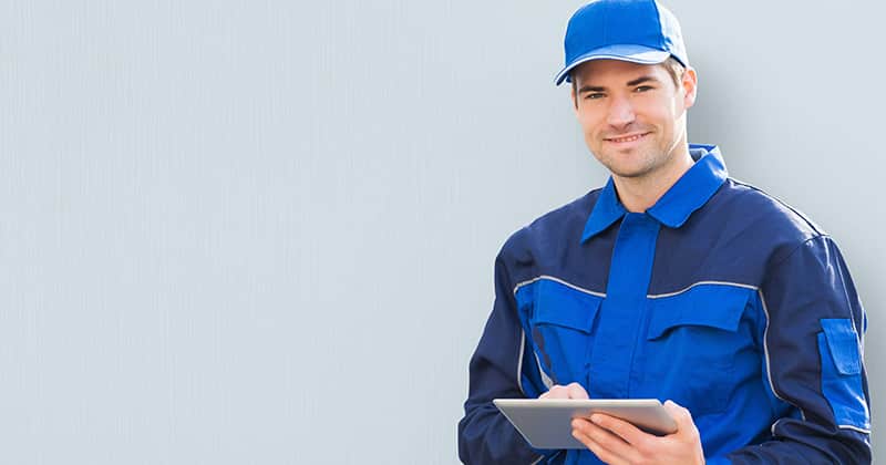 Pest control worker smiling at camera