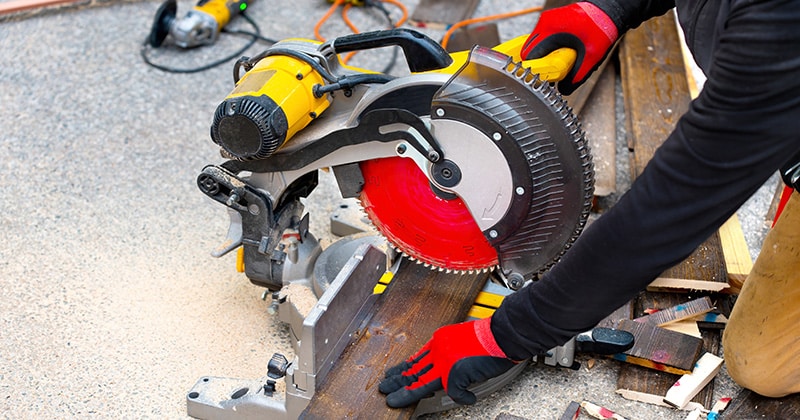 RED GLOVES USING SAW