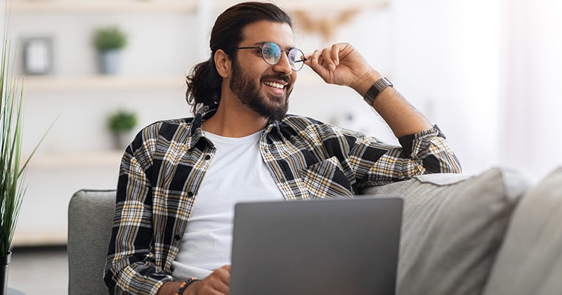 Contractor works on optimizing local seo with laptop