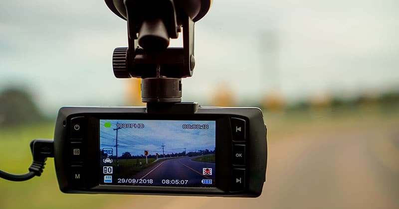 Looking through dash cam on windshield from inside car